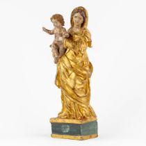 An antique woodsculpture of 'Madonna with Child' gilt and polychromie. 18th C. (L:10 x W:15 x H:40 c
