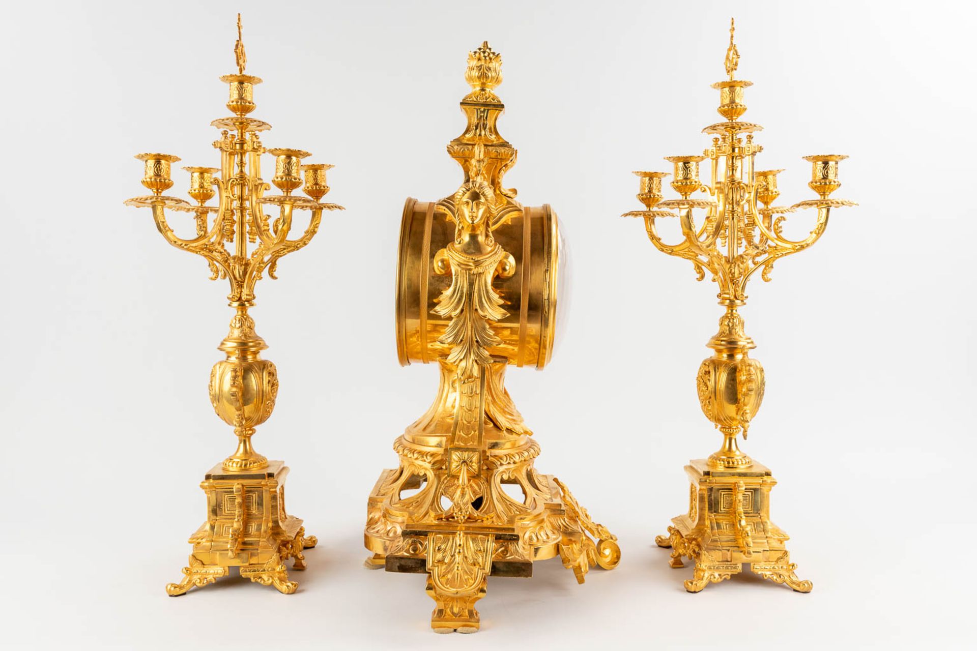 A three-piece mantle garniture clock and candelabra, gilt bronze in Louis XV style. 19th C. (L:28 x - Image 5 of 16