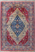 An Oriental hand-made carpet, Varamin. (L:28 x W:203 cm)
