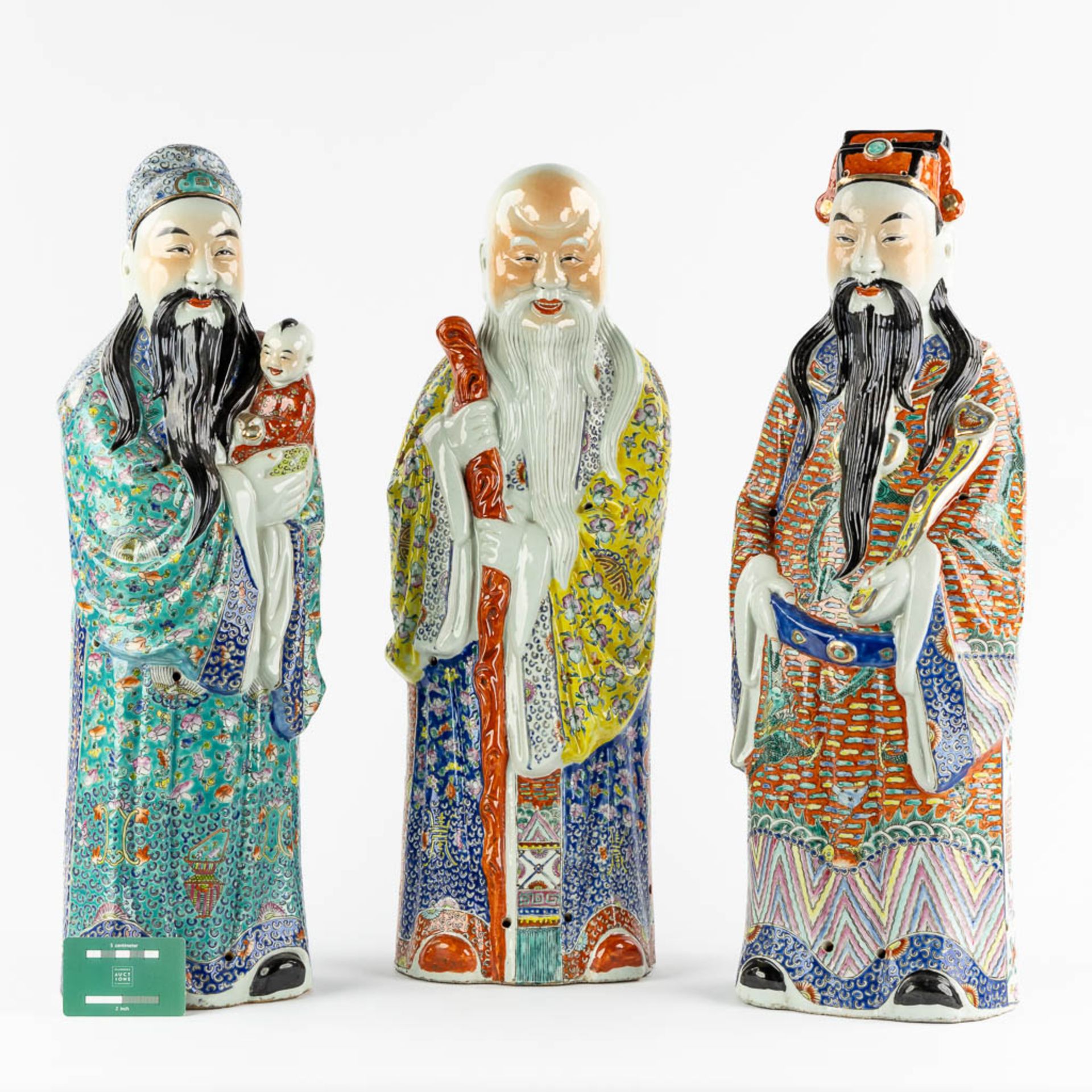 Three Chinese Famille Rose porcelain figurines of Fu, Lu and Shou. 20th C. (L:15 x W:20 x H:62,5 cm) - Image 2 of 17