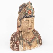 A large and antique wood sculptured buste of Guanyin. (L:28 x W:50 x H:69 cm)