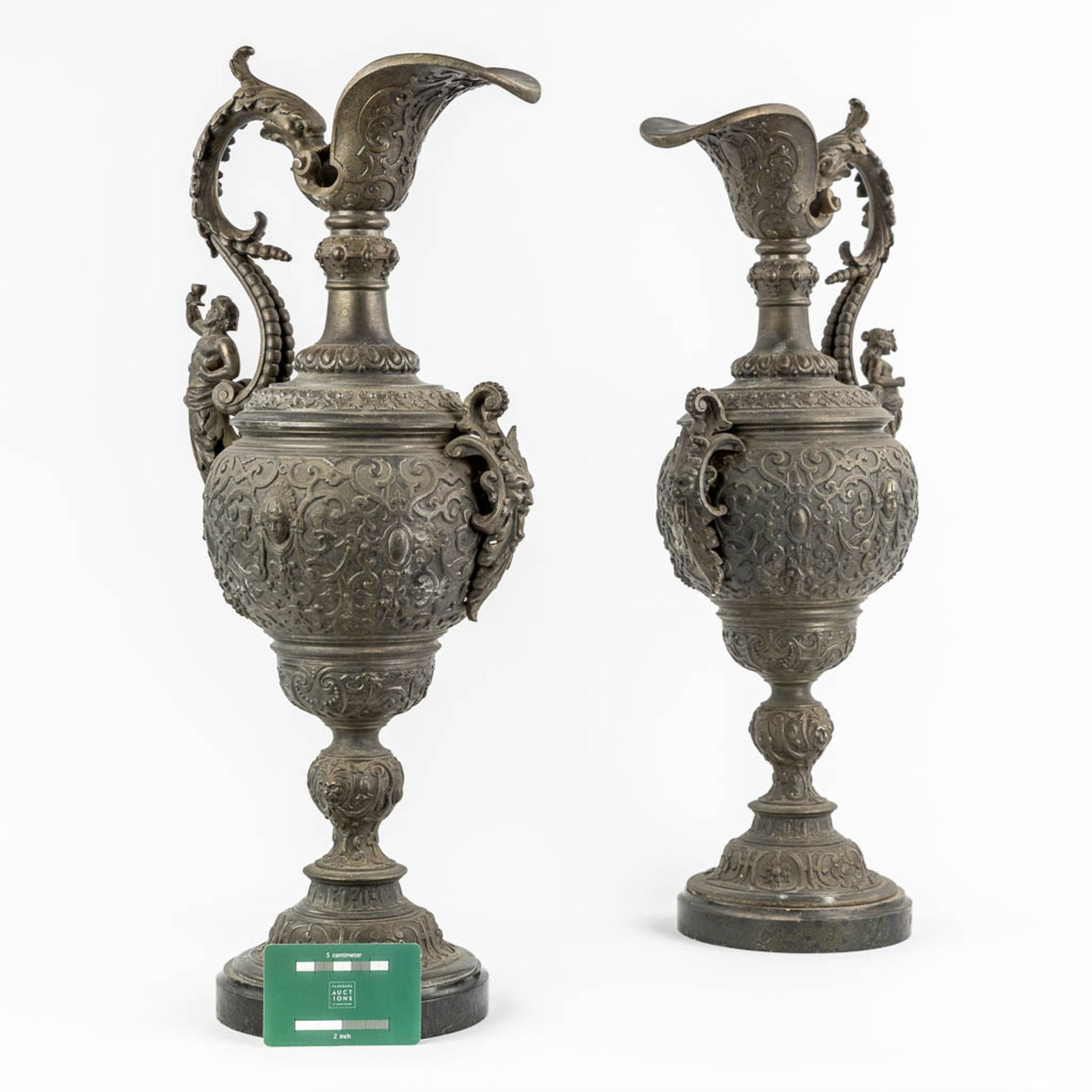 A pair of decorative pitchers, spelter on a marble base. Circa 1900. (L:18 x W:23 x H:56 cm) - Image 2 of 14
