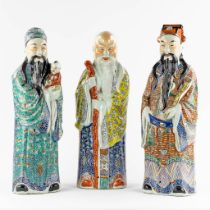 Three Chinese Famille Rose porcelain figurines of Fu, Lu and Shou. 20th C. (L:15 x W:20 x H:62,5 cm)