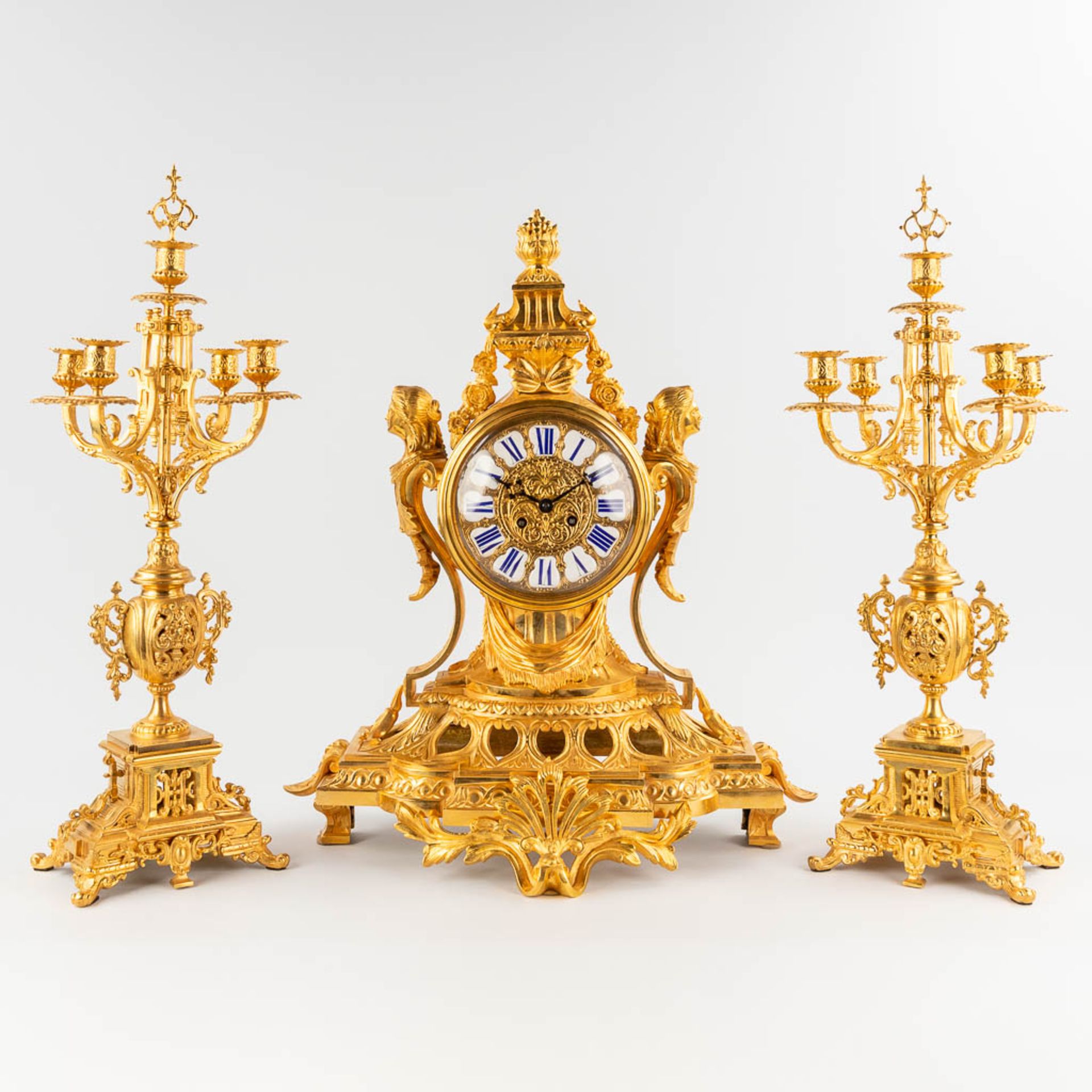 A three-piece mantle garniture clock and candelabra, gilt bronze in Louis XV style. 19th C. (L:28 x - Image 3 of 16