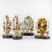 A three-piece mantle garniture under glass domes. Added a 'Fruit and flower bouquet'. 19th C. (L:21