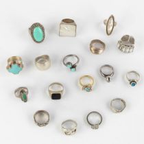 A collection of rings, silver with Turquoise, Mother of Pearl, facetted glass and others. 138,7g.