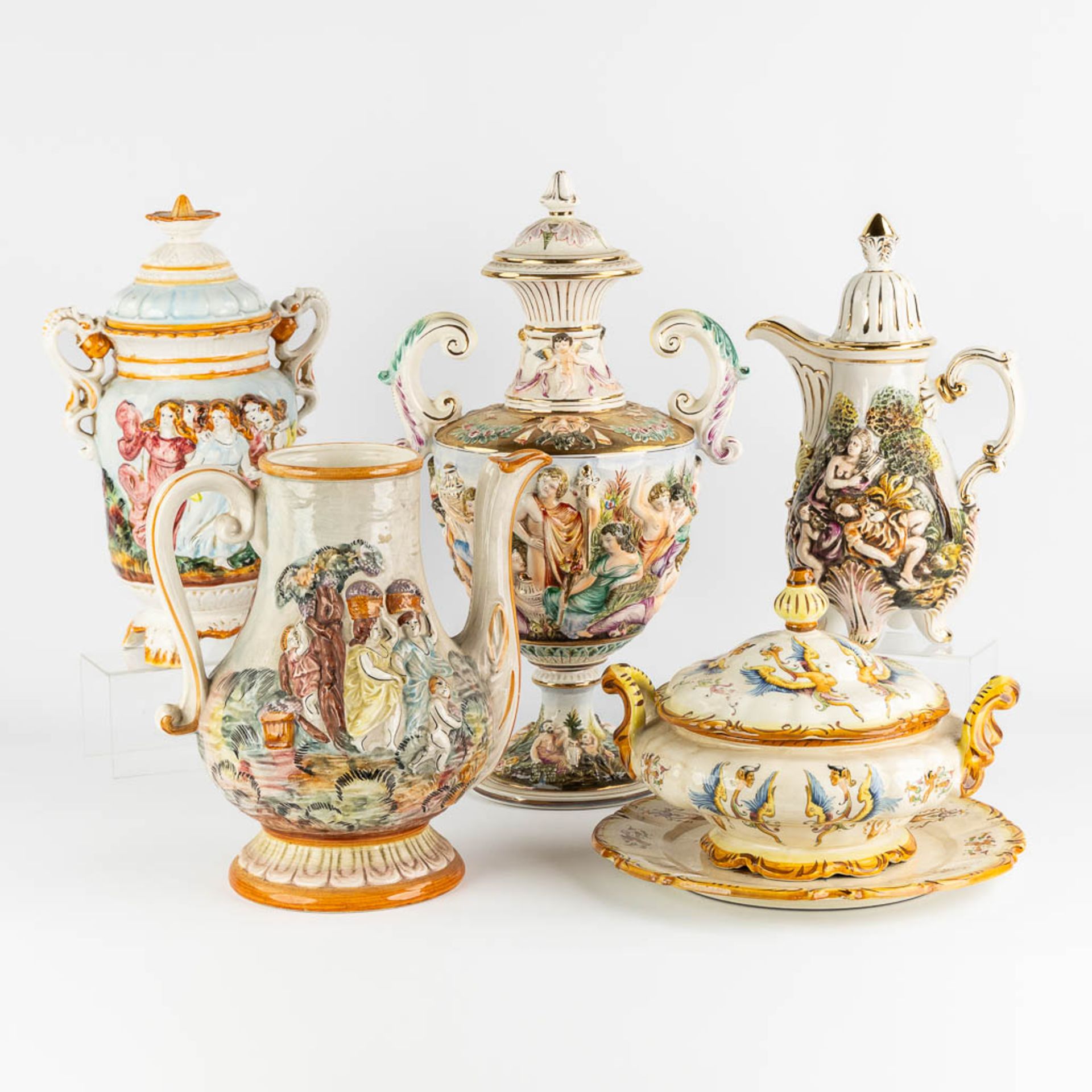 Capodimonte, 5 large pitchers, vases and urns. Glazed faience. (L:23 x W:31 x H:50 cm)