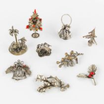9 pieces of Christmas decoration, silver. 138,5g. (H:4,6 cm)