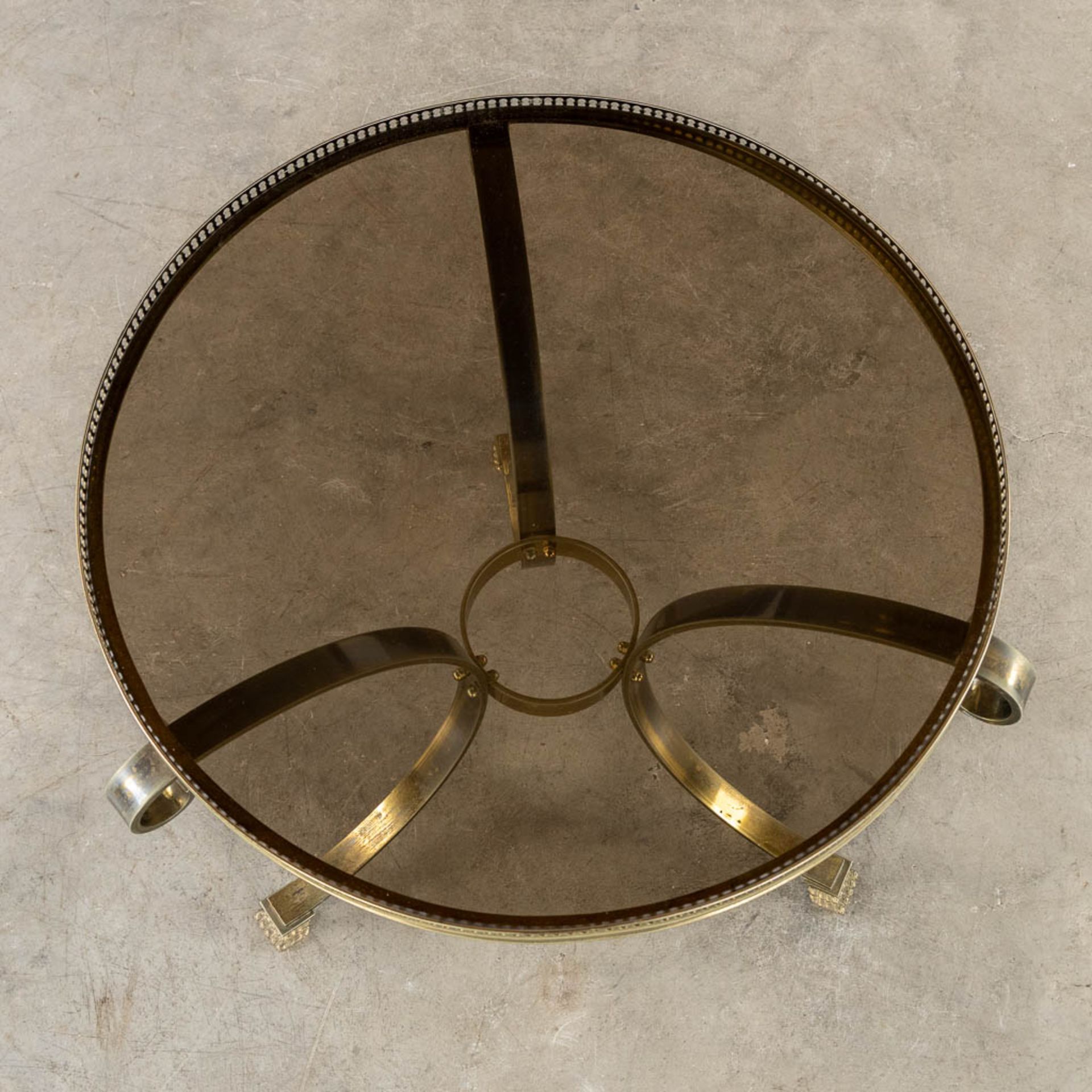 A mid-century side table, gilt metal with a tinted glass top. (H:57 x D:64 cm) - Image 6 of 9