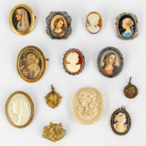 A collection of cameo, brooches with miniature paintings and a small sculpture. Silver and plated me