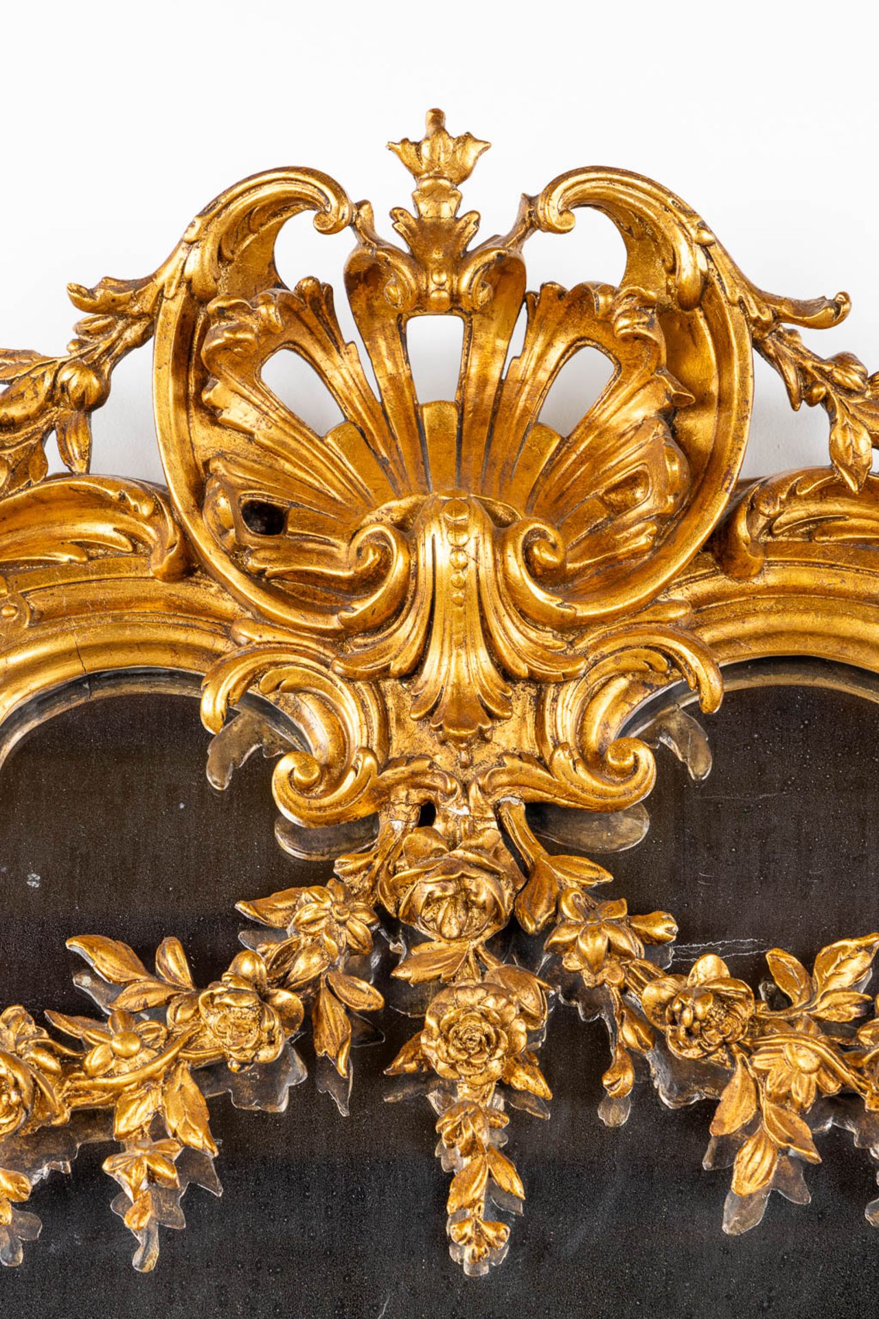 A mirror, sculptured wood, and stucco in a Louis XV style. 20th C. (W:110 x H:218 cm) - Image 7 of 13