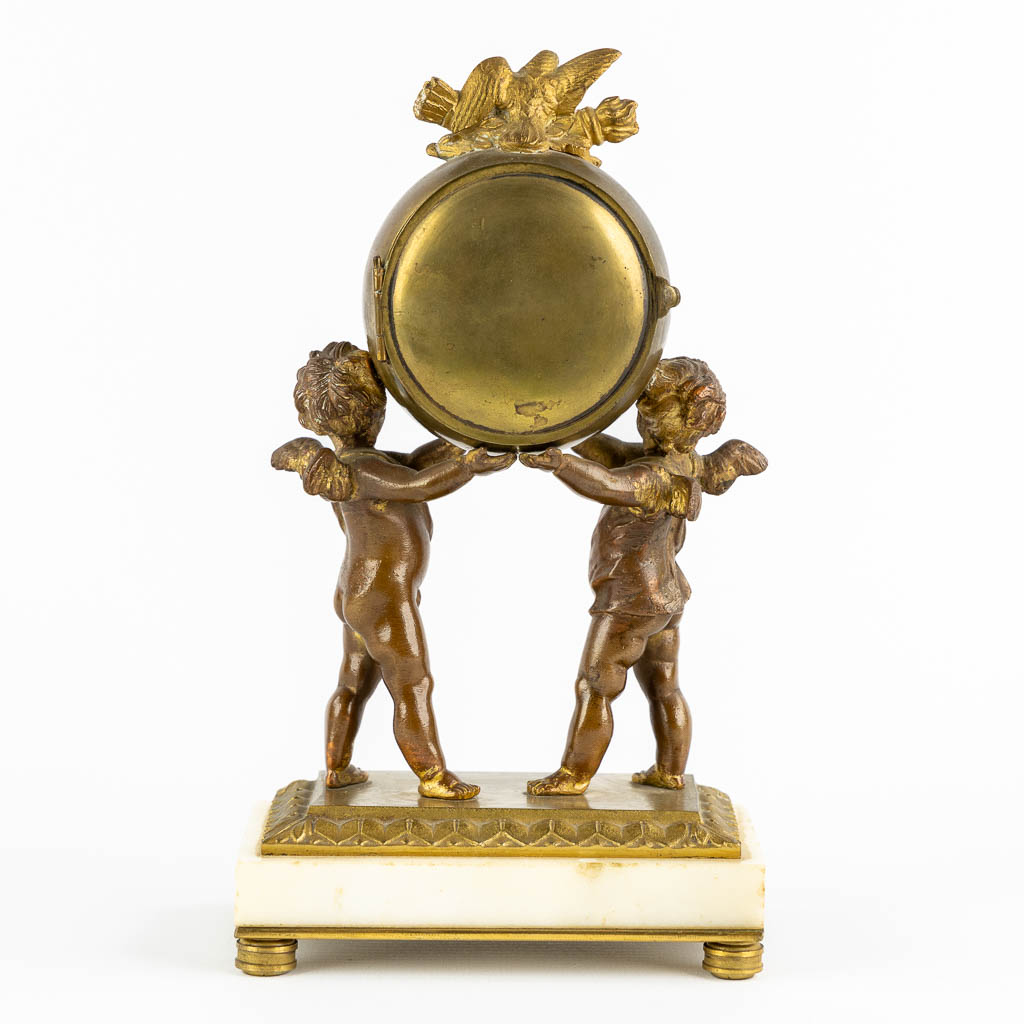 A Louis XVI style Mantle Clock, Putti holding a globe. Gilt bronze. Circa 1900. (L:8 x W:12 x H:21 c - Image 5 of 12