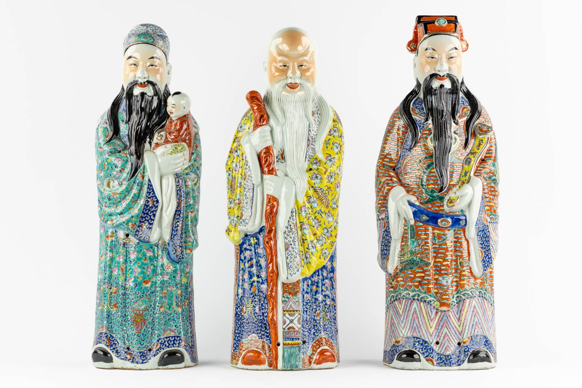 Three Chinese Famille Rose porcelain figurines of Fu, Lu and Shou. 20th C. (L:15 x W:20 x H:62,5 cm) - Image 3 of 17