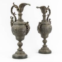 A pair of decorative pitchers, spelter on a marble base. Circa 1900. (L:18 x W:23 x H:56 cm)