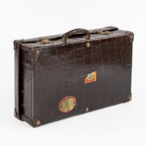 A vintage suitcase, crocodile leather. Circa 1930. (L:43 x W:67 x H:20 cm)