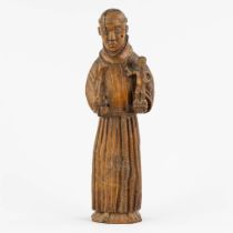 An antique wood sculpture of Saint Anthony of Padua. 17th C. (L:7 x W:11 x H:36 cm)