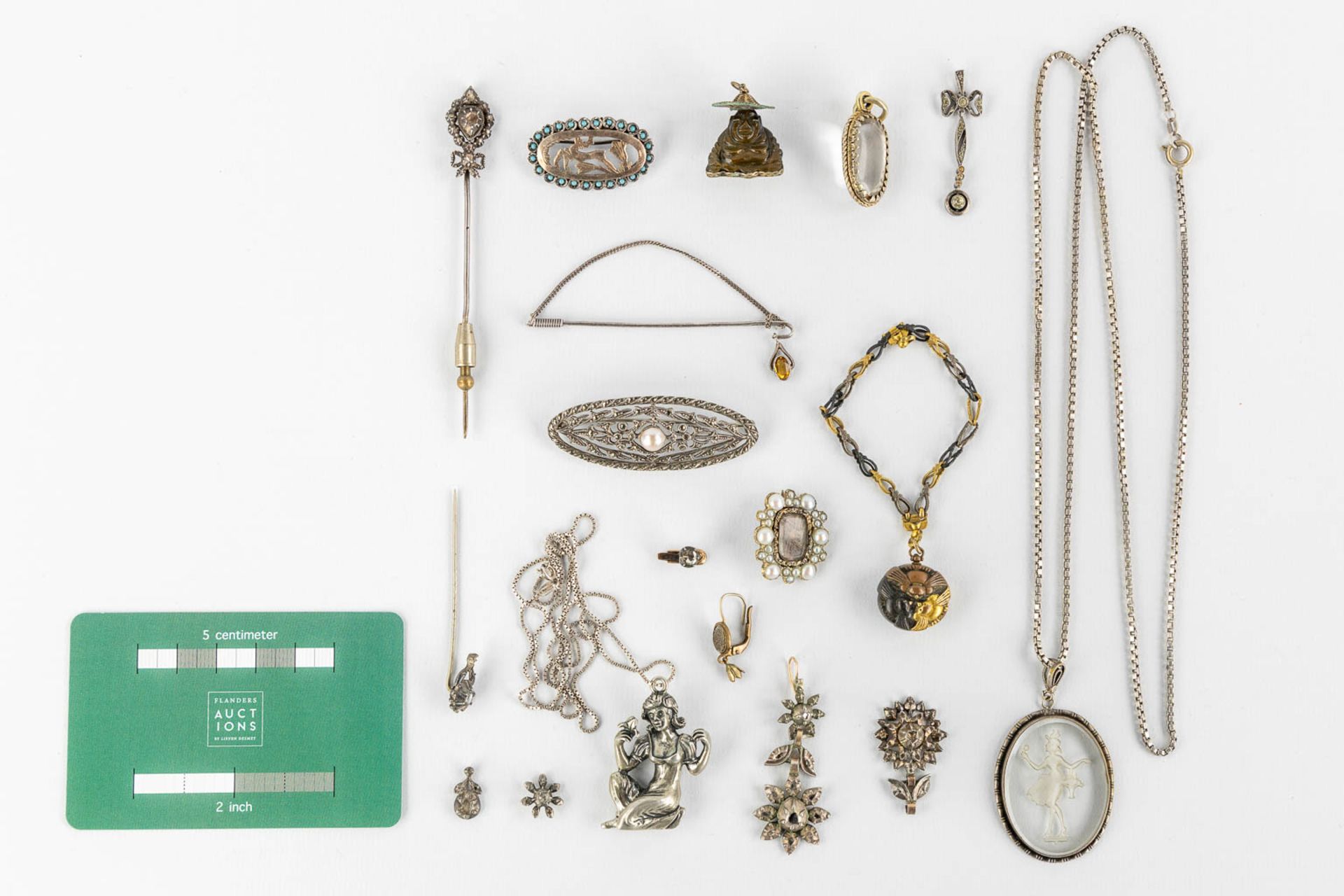 A collection of silver brooches, pendants, earrings and a pin with old-cut diamonds. 117g. - Image 2 of 15