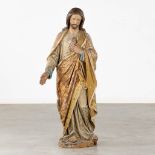 An antique wood-sculptured figurine of Jesus Christ, polychrome. 18th/19th C. (L:25 x W:50 x H:116 c