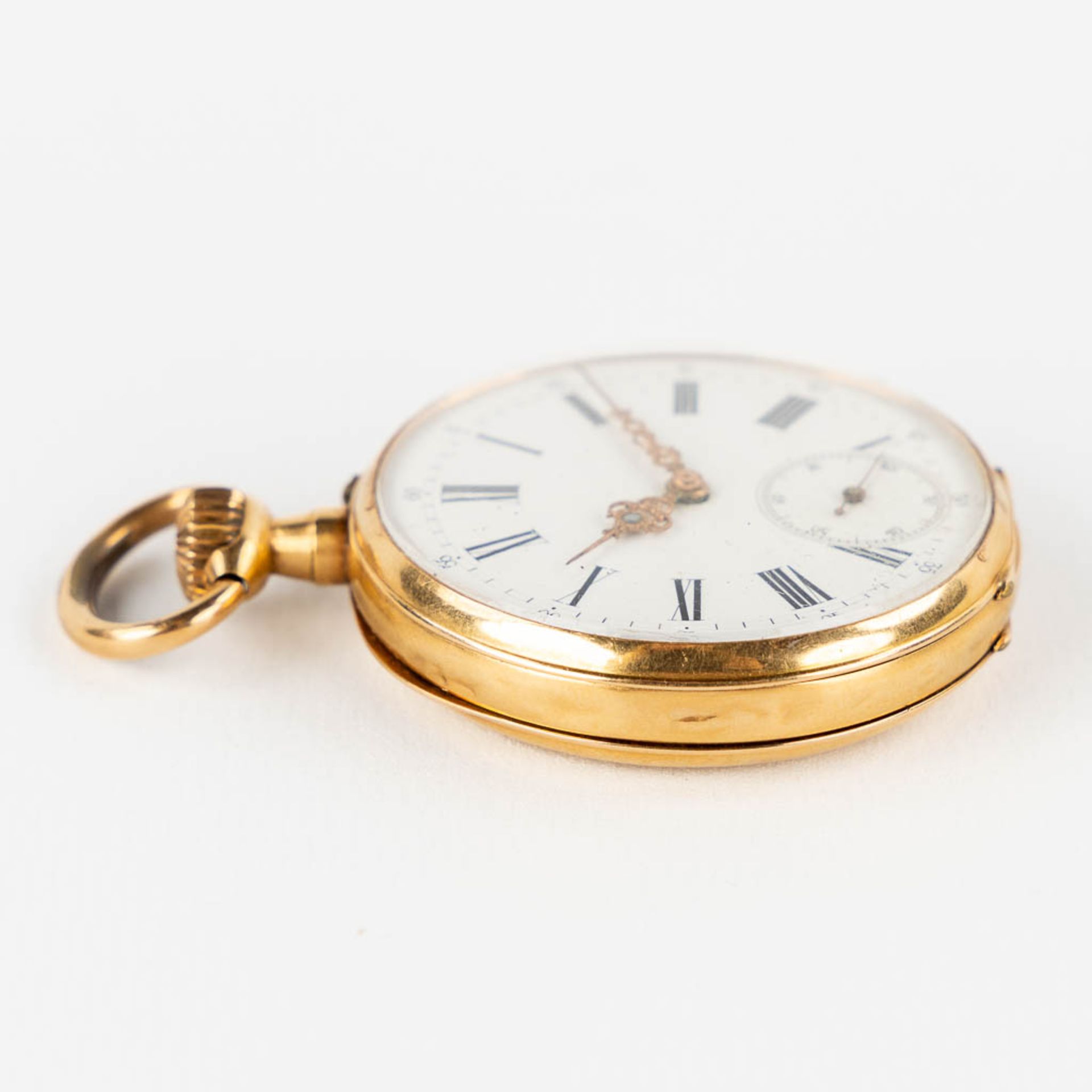 An antique pocket watch, 18kt yellow gold with a white enamel dial. (H:6,3 x D:4,3 cm) - Image 4 of 10