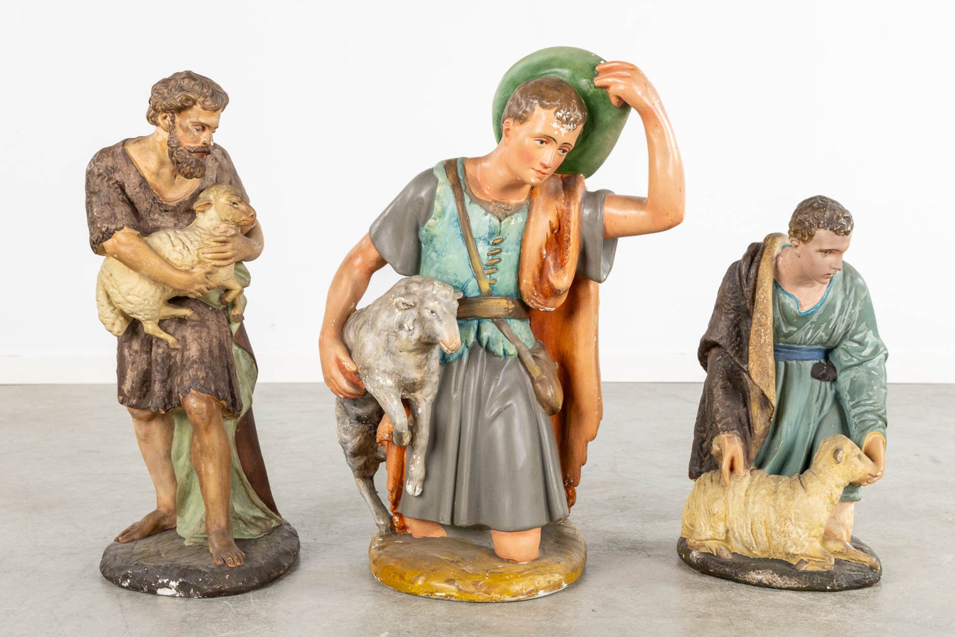 An 11-piece 'Nativity scène', polychrome plaster. (H:64 cm) - Image 16 of 19