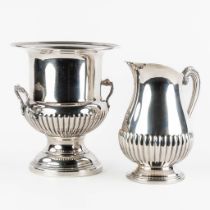 Christofle and Fleuron, a champagne cooler and pitcher. Silver-plated metal. (H:26 x D:22,5 cm)