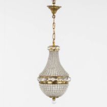 A decorative hall lamp, 'Sac à Perles'. Brass and glass. (H:44 x D:23 cm)
