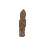 An African Tribal Dogon Stone Figure in Classic Pose,