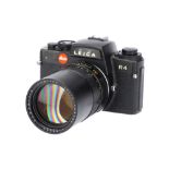 A Leica R4 SLR Camera,