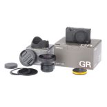 A Ricoh GR III Compact Digital Camera and GW-4 Wide Lens