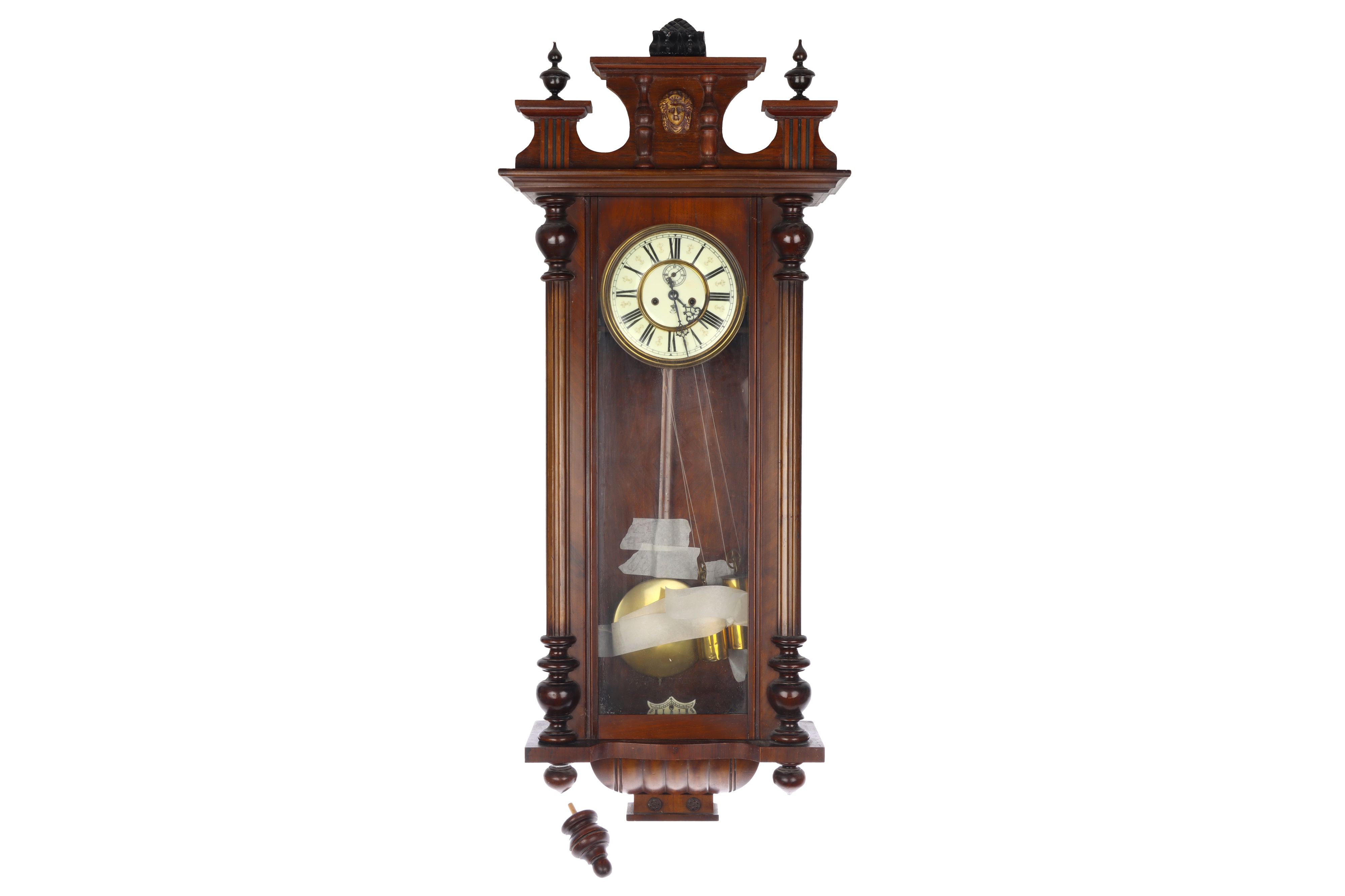 A 19th century oak cased Vienna style wall clock with twin train weight driven movement by Gustav