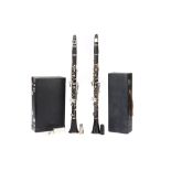Two Cased Clarinets,
