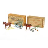 Boxed horse-drawn farm vehicles by Olson Farminit and Kayron,