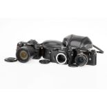 Three Nikon SLR Cameras