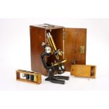 A 'Jug-Handle' Microscope By Reichert,