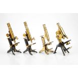 A Collection of 4 Compound Brass Microscopes by Swift