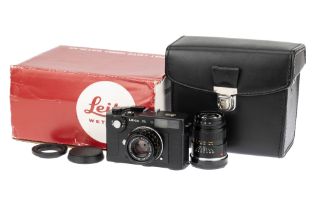 A Leica CL Rangefinder Camera,