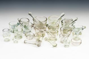 A Large Collection of Glass Mortar & Pestles,