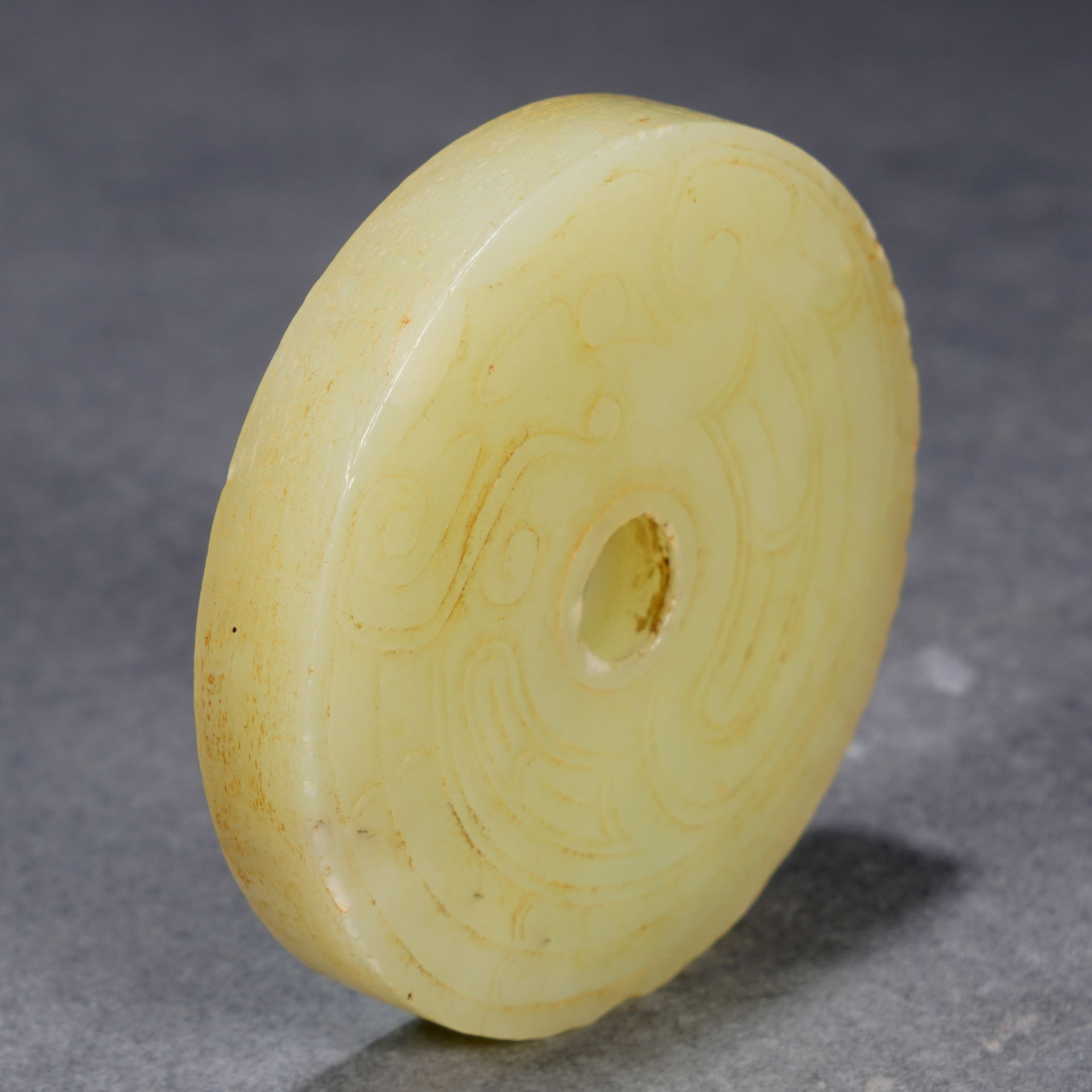 A Chinese Archaistic Yellow Jade Disc Bi - Image 3 of 9