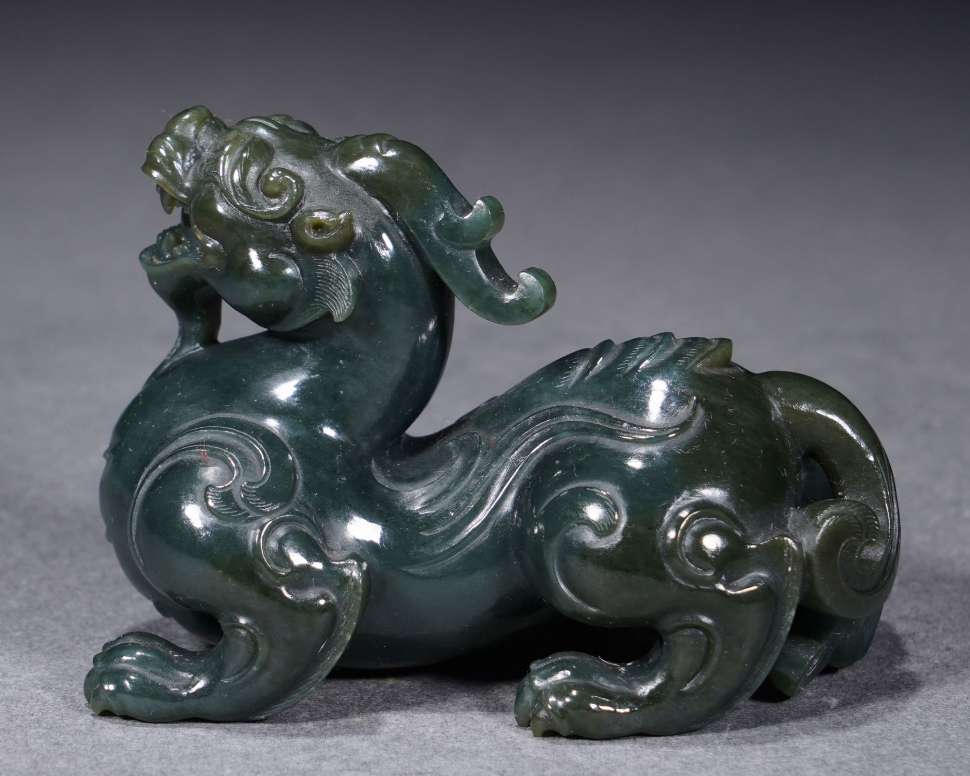 A Chinese Carved Spinach Green Jade Mythical Beast Pixiu - Image 4 of 9