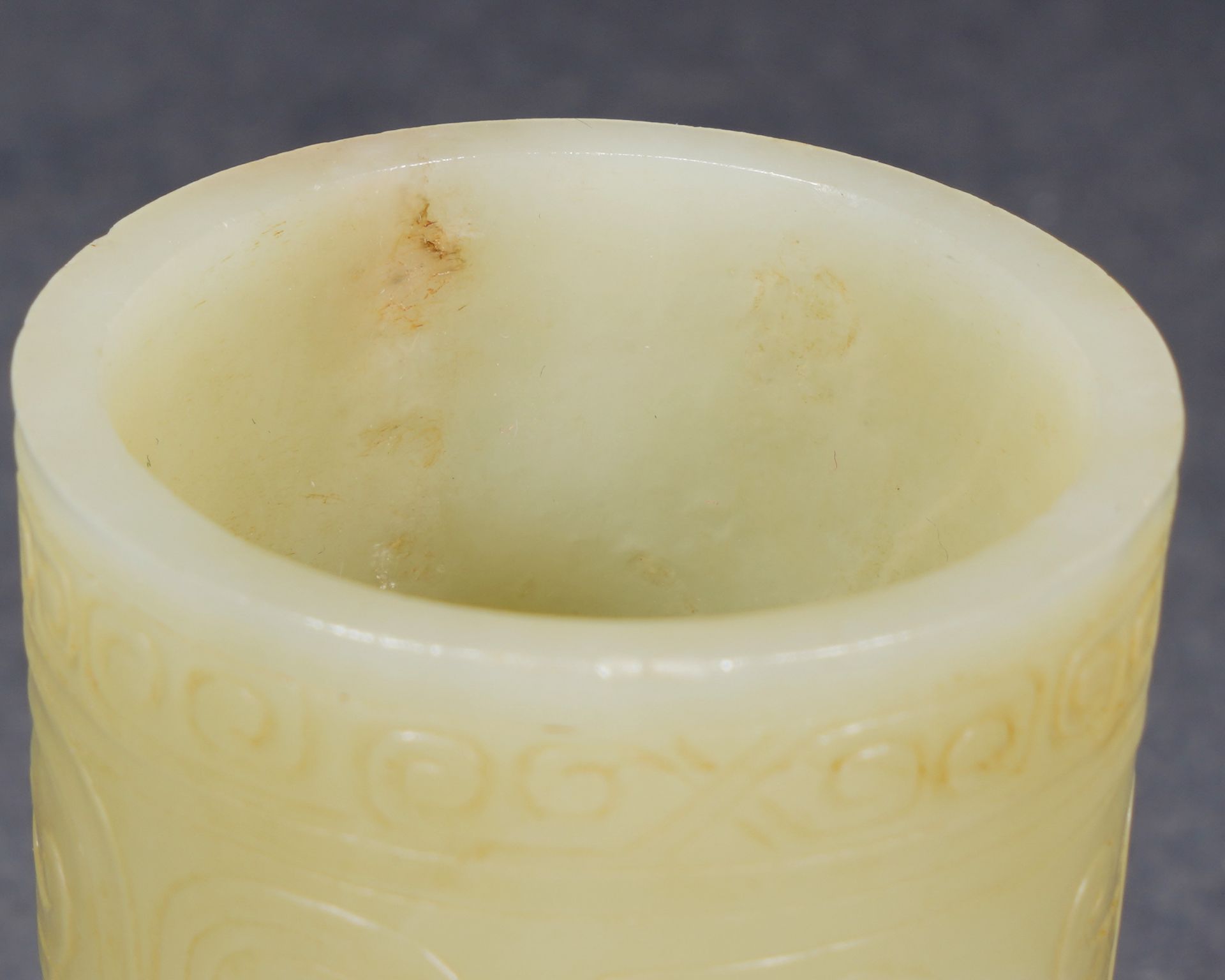 A Chinese Archaistic Carved Yellow Jade Goblet - Image 6 of 9