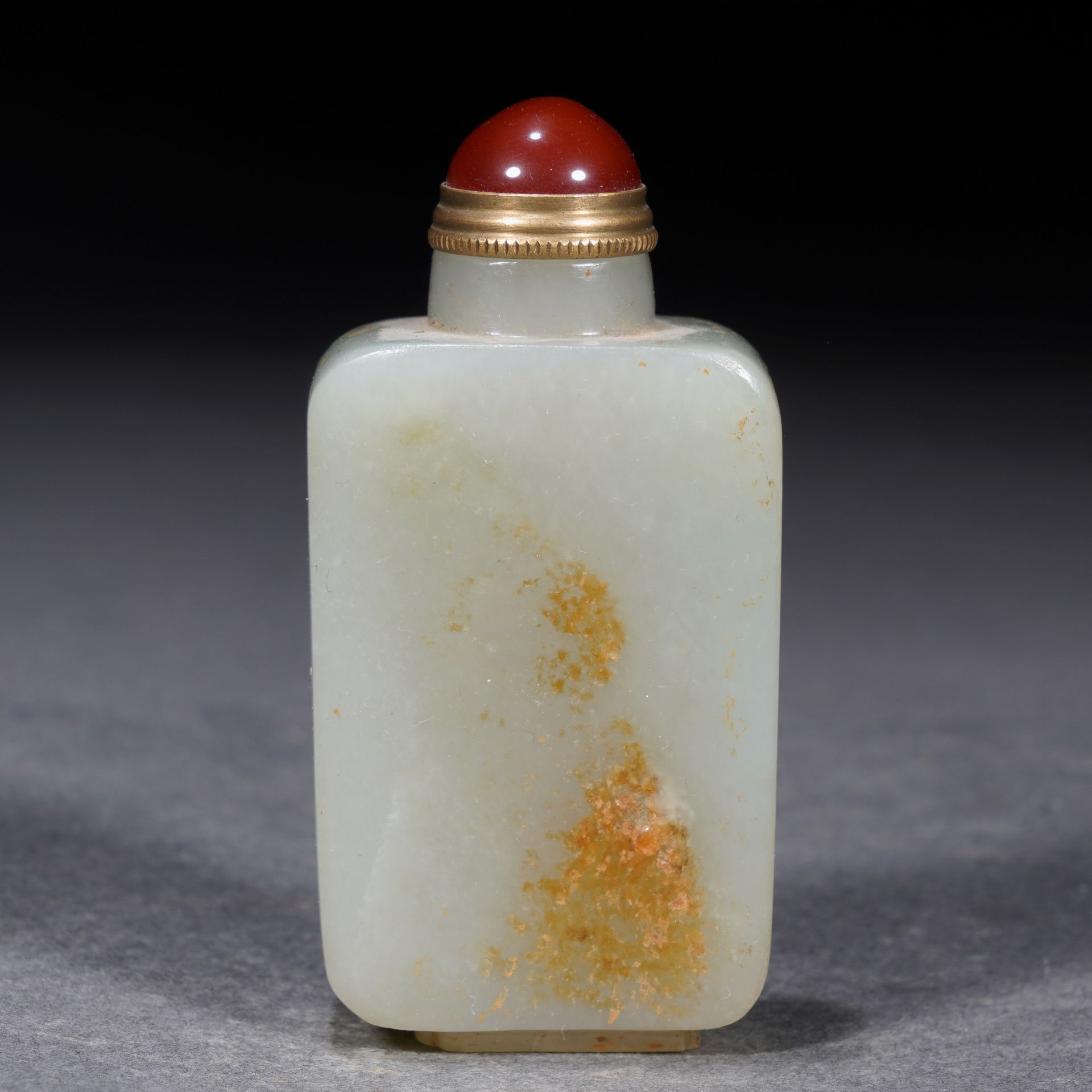 A Chinese Carved White Jade Snuff Bottle