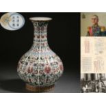 A Chinese Famille Rose and Gilt Sanskirt Vase