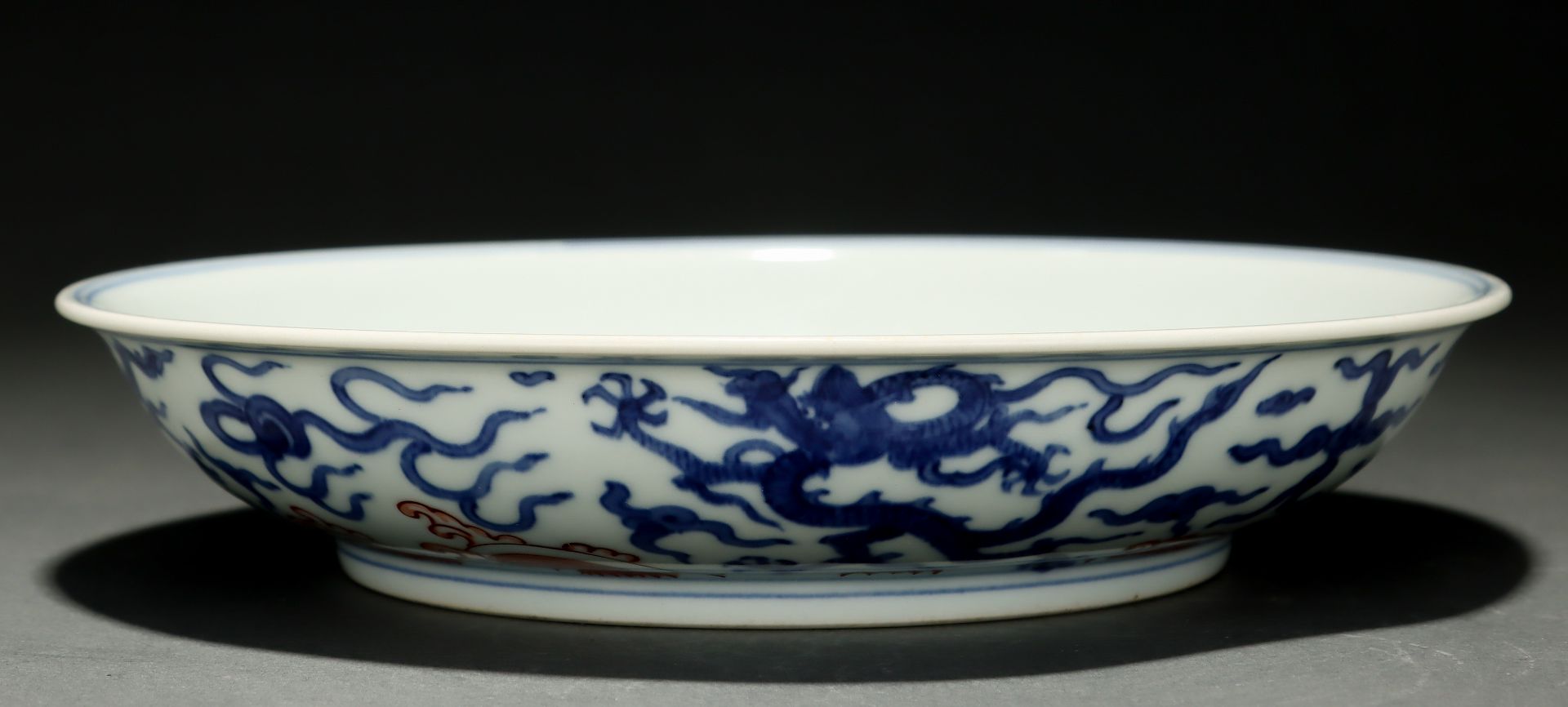 A Chinese Underglaze Blue and Iron Red Dragon Plate - Image 7 of 9