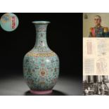 A Chinese Turquoise Ground and Famille Rose Vase