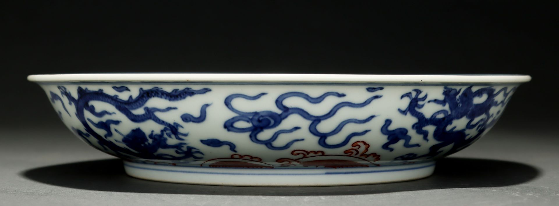 A Chinese Underglaze Blue and Iron Red Dragon Plate - Image 8 of 9