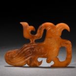 A Chinese Carved Jade Mythical Bird