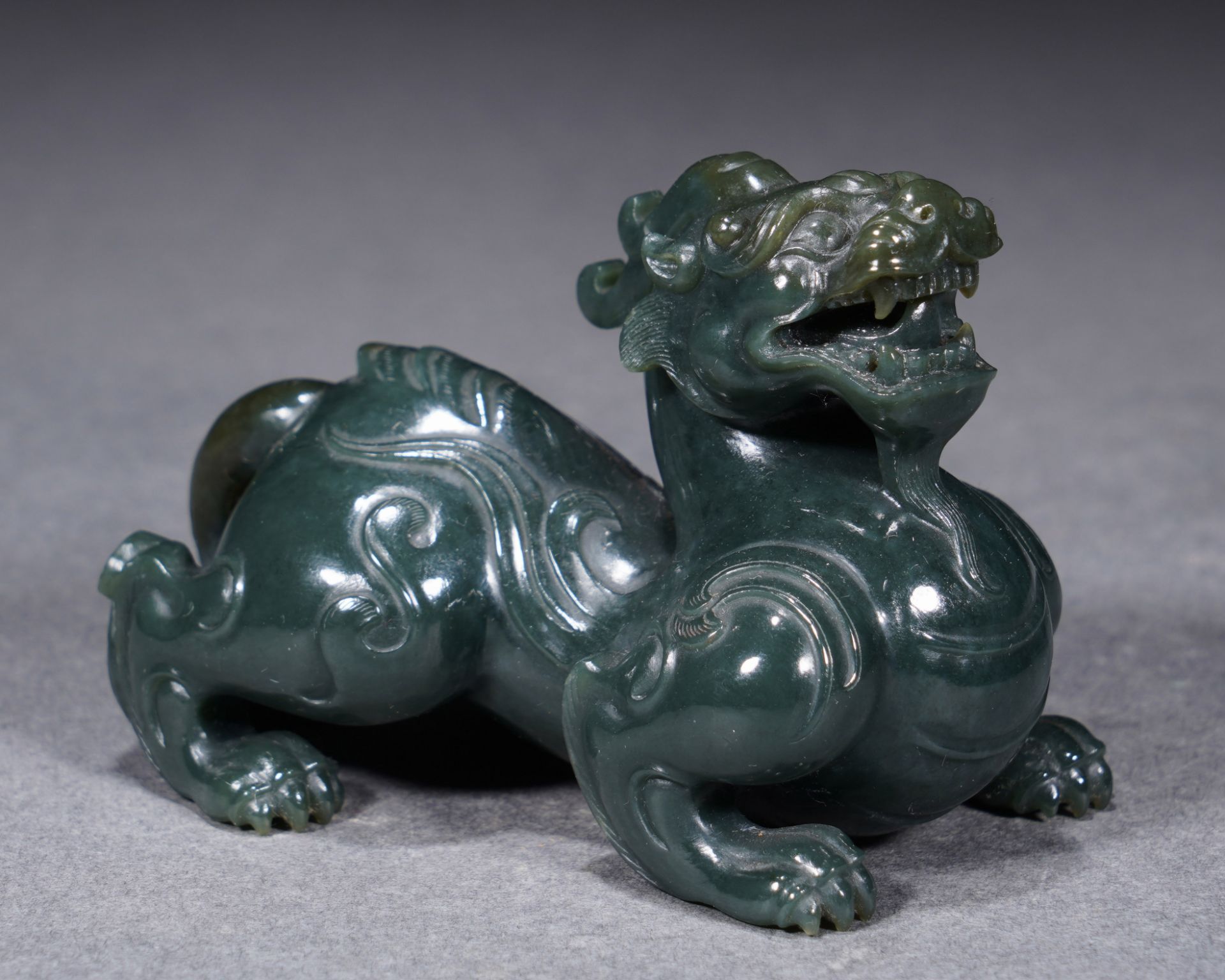 A Chinese Carved Spinach Green Jade Mythical Beast Pixiu