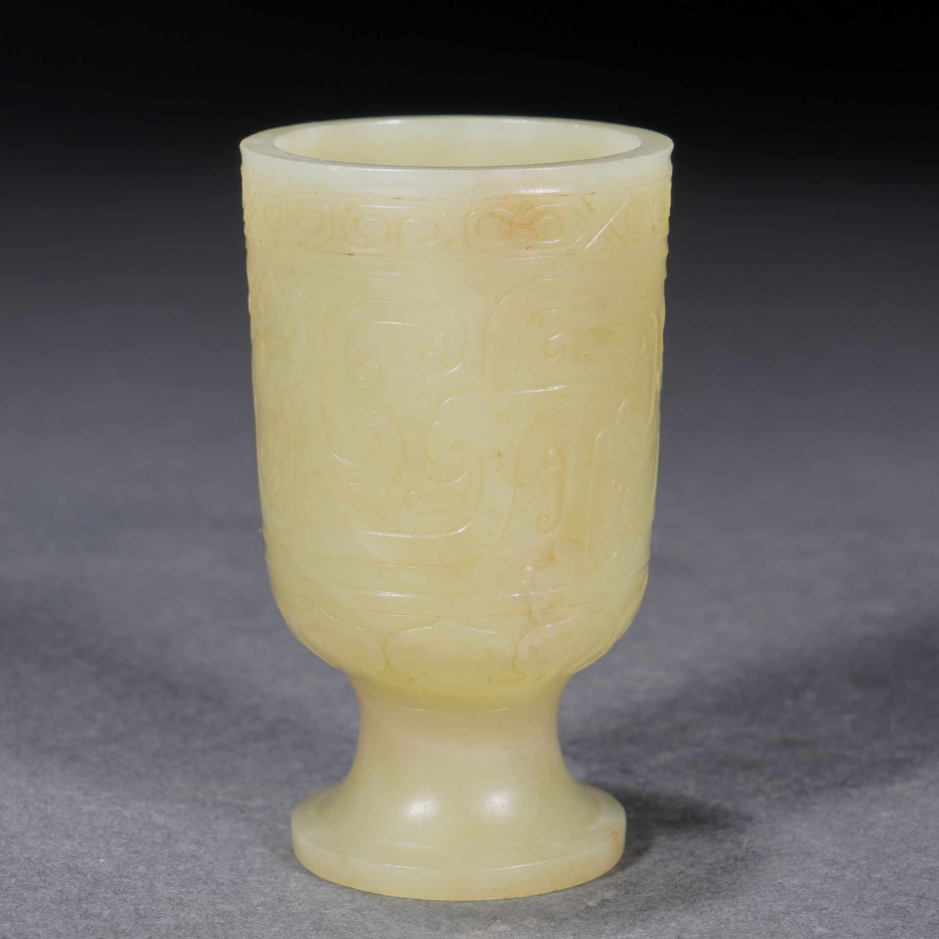 A Chinese Archaistic Carved Yellow Jade Goblet - Image 5 of 9