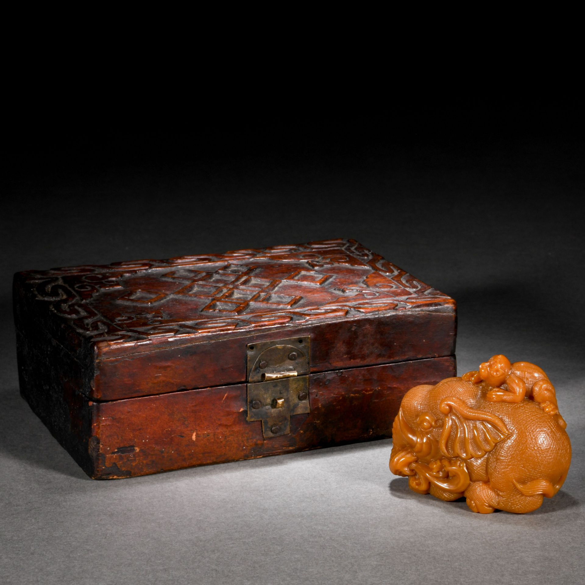 A Chinese Carved Tianhuang Beast Ornament with Box