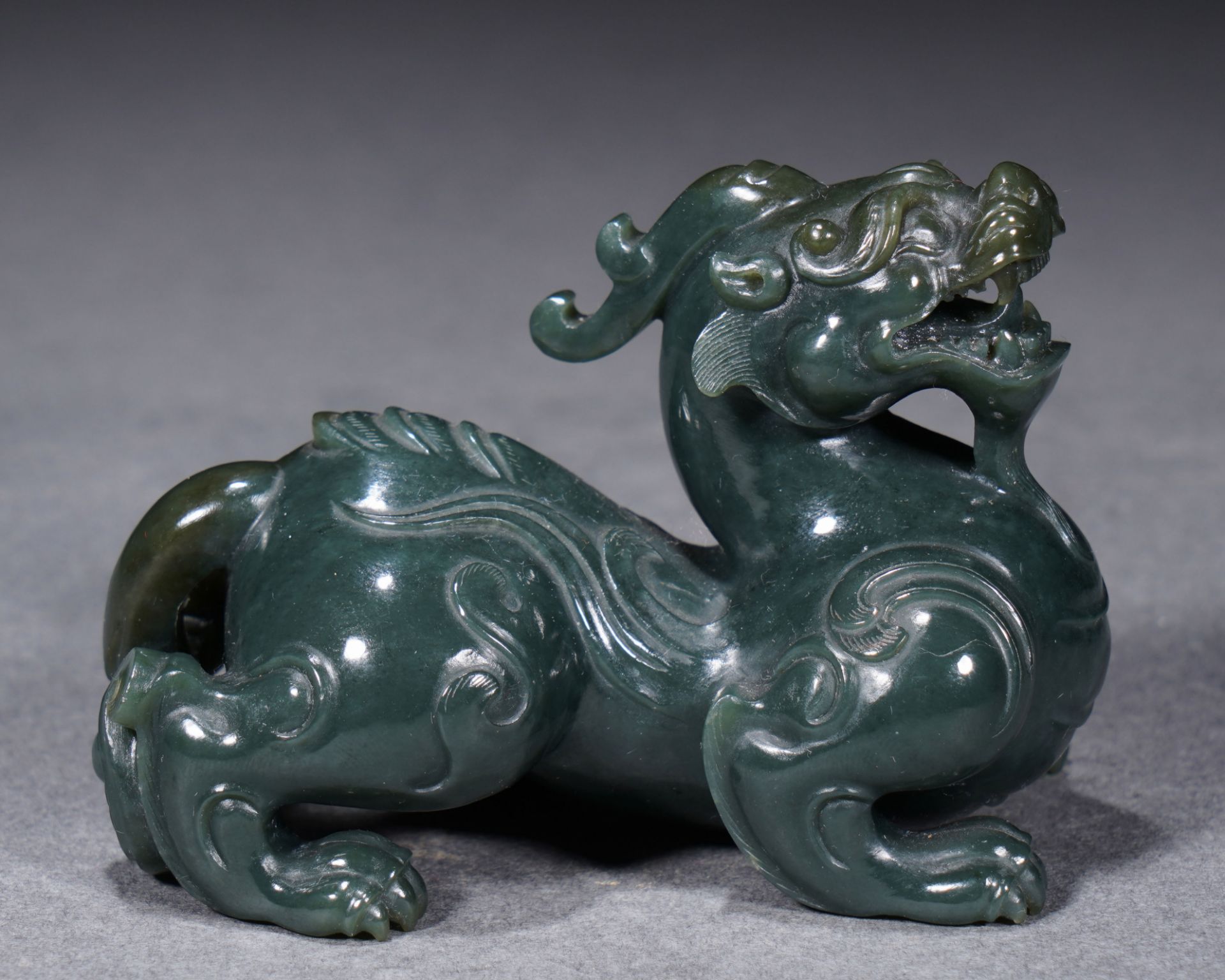 A Chinese Carved Spinach Green Jade Mythical Beast Pixiu - Image 7 of 9